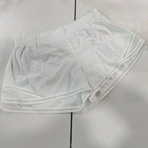 lululemon athletica White Hotty Hot 4" lined white size 12 lace trim